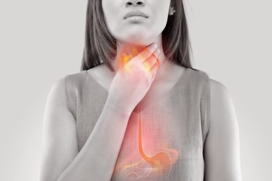Canva-Woman-Suffering-From-Acid-Reflux-Or-Heartburn-Isolated-On-White-Background-copia-scaled